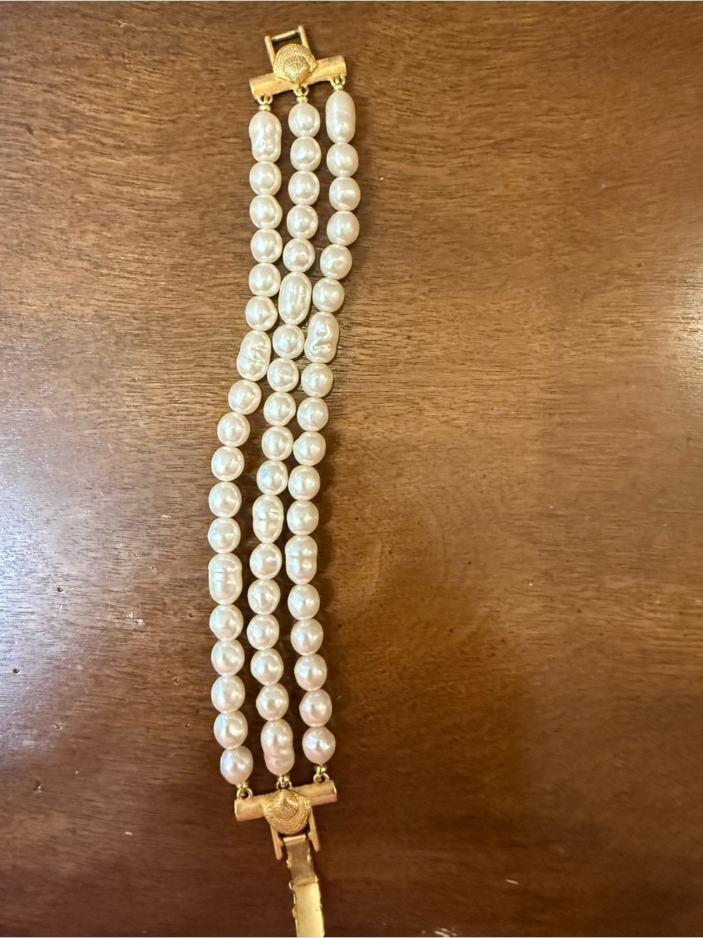 Three-Strand White Pearl Bracelet with Gold-Tone Clasp